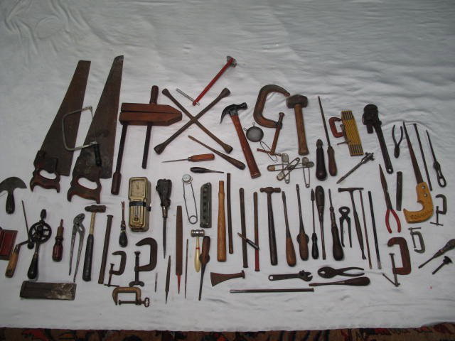 BOX LOT ASSORTED ANTIQUE TOOLS: SAWS DRILLS LEVEL : Box lot of assorted antique tools. Includes saws, level, drills, and more. Generally good condition, signs of age and wear, see images. Longest saw measures 27.5" long. Shipping weight 40 lbs.