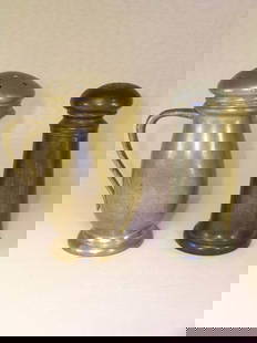PEWTER SHAKERS DICKERSON SHEFFIELD MAYFLOWER 2 pc: PEWTER SHAKERS DICKERSON SHEFFIELD MAYFLOWER 2 pc - James Dickerson Sheffield Pewter shaker measures 4 1/2" high by 2" wide. Mayflower Pewter with handle 2549 Pat Mar 18'30 USA on bottom, measures 4