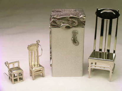 STERLING SILVER FIGURAL JEWELRY & MATCH HOLDER: STERLING SILVER FIGURAL JEWELRY & MATCH HOLDER - Art Nouveau style ornate pewter match box has a striker on the base measures 2" high by 1" wide. Jewelry set is sterling 925 is pin & earrings of
