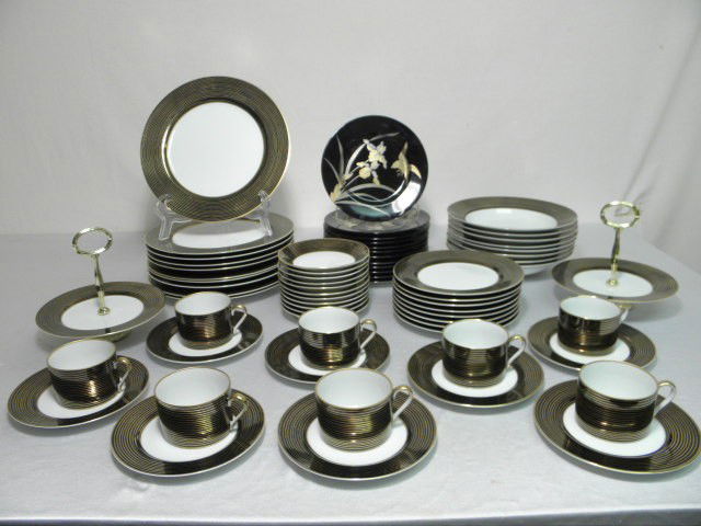 FITZ AND FLOYD PORCELAIN GILT DINNERWARE SET 67 PCS: Fitz and Floyd porcelain gilt dinnerware set. Includes 67 total pieces. 55 pieces are pattern "Rondelle", and the remaining 12 plates are "Oiseau Dore" pattern. "Rondelle" pattern set includes (8) 9.2