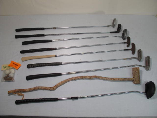 LOT NINE ASSORTED GOLF CLUBS: PUTTERS: Lot of nine assorted golf clubs. Includes all putters. Brands such as Odyssey, Acushnet, Zebra, Taylor Made, Bullet, and more. Condition good, see images .Longest measures 36". Shipping weight 10 lbs.