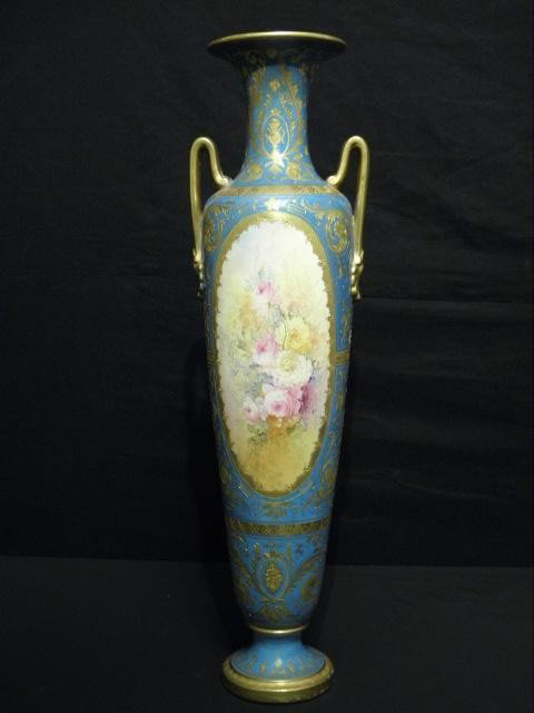 ROYAL BONN PORCELAIN HAND PAINTED VASE: Royal Bonn porcelain hand painted vase. Blue with gilt and hand painted floral painting. Handles on each side. Royal Bonn mark on bottom. Condition: some crazing to paint, see images. Measures 22" tal