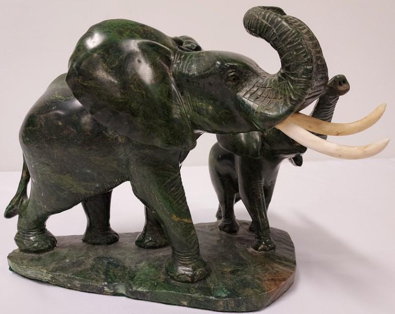 ROBERT KALIYONGO CHIMUNGWA VERDITE STONE CARVING: Robert Kaliyongo Chimungwa Zimbabwean green verdite stone carving of two elephants. Signed on the backside along lower edge. Includes receipt and certificate from Johannesburg Gallery Variety Art. Mea