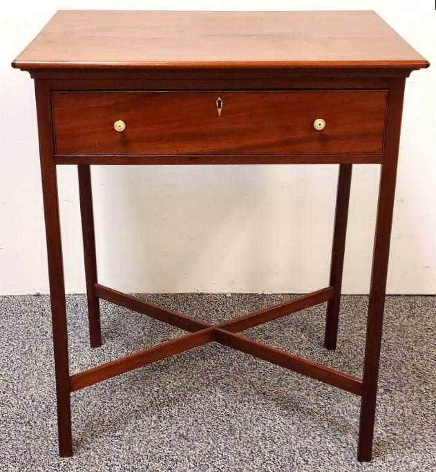 EDWARDIAN MAPLE ONE DRAWER STAND: Small Edwardian maple wood one drawer stand with lower stretcher. Measures a total of 28.25" tall x 23.5" wide and 16.75" deep. Bone pulls and keyhole surround. Condition: no losses or repairs, minor 