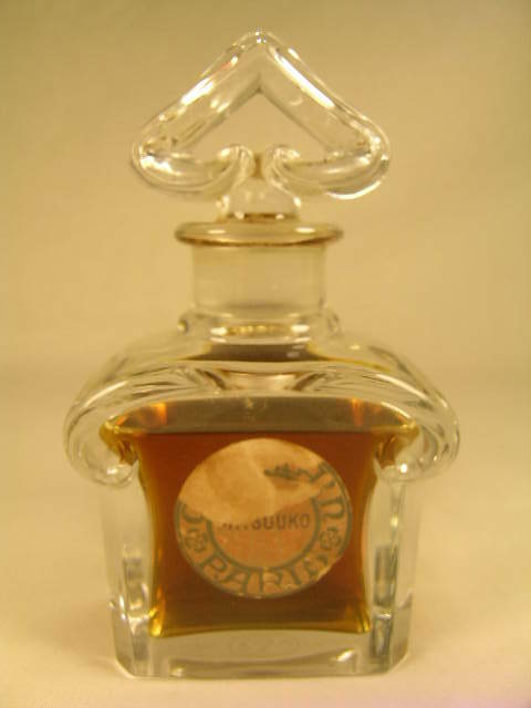 BACCARAT CRYSTAL PERFUME BOTTLE GUERLAIN: Lot Number: 185 - BACCARAT CRYSTAL PERFUME BOTTLE GUERLAIN - Perfume has been opened. Bottle and stopper are in good condition. Bottle measures with stopper 4 1/2" high by 2 1/2" wide.