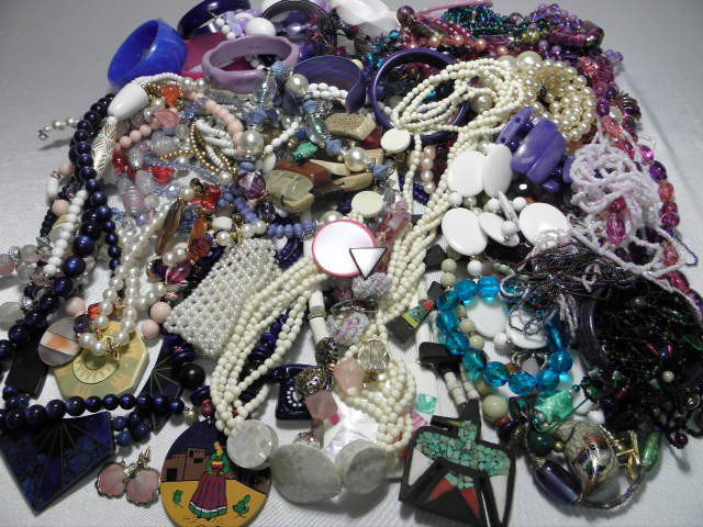 BOX LOT ASSORTED LADIES COSTUME JEWELRY BEADS ETC: Box lot of assorted ladies costume jewelry. Includes mostly beaded pieces. Necklaces, bracelets, earrings, and more. Variety of colors and styles. Faux pearls, all types of beads, enamel, faux gems et