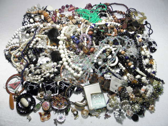 ASSORTED LADIES COSTUME JEWELRY BEADS ETC: Assorted ladies costume jewelry. Includes mostly beaded styles. Necklaces, earrings, bracelets, and more. Gold toned, silver toned, beads, wood, crystal, faux pearls, faux gems, enamel, fur, leather, 
