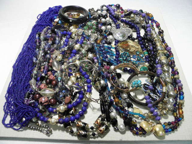 LOT ASSORTED LADIES COSTUME JEWELRY: FERRAGAMO ETC: Lot of assorted ladies costume jewelry. Includes necklaces, bracelets, pins, earrings, pins and more. Enamel, beads, gold tones, silver tones, glass beads, mother of pearl, faux gems and more. Conditi