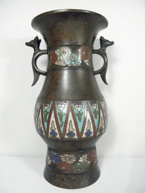 CHINESE BRONZE CLOISONNE VASE: Chinese bronze cloisonne vase. Finished bronze with cloisonne colors of blue, red, white, etc. Figural handles on each side. Stamped on base with character mark. Condition: wear to finish, minor dings