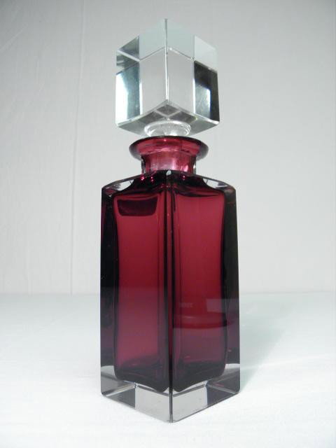 POSSELL GERMAN RUBY CUT CRYSTAL DECANTER: Possell German ruby cut crystal decanter. Hand cut leaded crystal. Square design with cube stopper. Paper label in front, signed on base illegibly, and acid etched on base "Possell". Condition: good, 