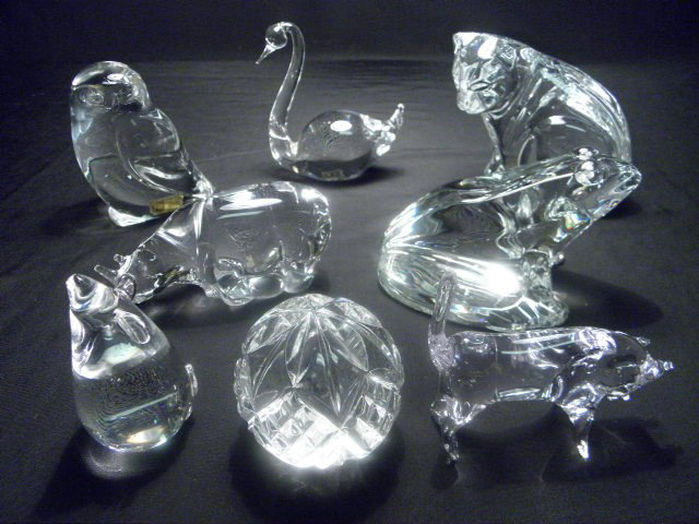 EIGHT CRYSTAL ANIMAL PAPER WEIGHTS: BACCARAT WATER: Eight crystal animal paper weights and figurines. Includes Hadeland lead crystal owl, Baccarat frog, Waterford cat, Kosta Swedish swan, bull, mouse, rhino, and cut crystal orb. Condition: good, see im