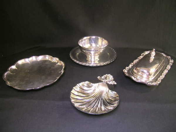 ASST SILVER PLATE DISH BUTTER TRAY SAUCE BOAT 4 PC: Lot : 583 - ASST SILVER PLATE DISH BUTTER TRAY SAUCE BOAT 4 PCS - Includes Sheffield shell dish, 6" long x 5" wide, Gorham scalloped plate at 7 3/4" wide, W A Rogers sauce dish at 8" wide and internat