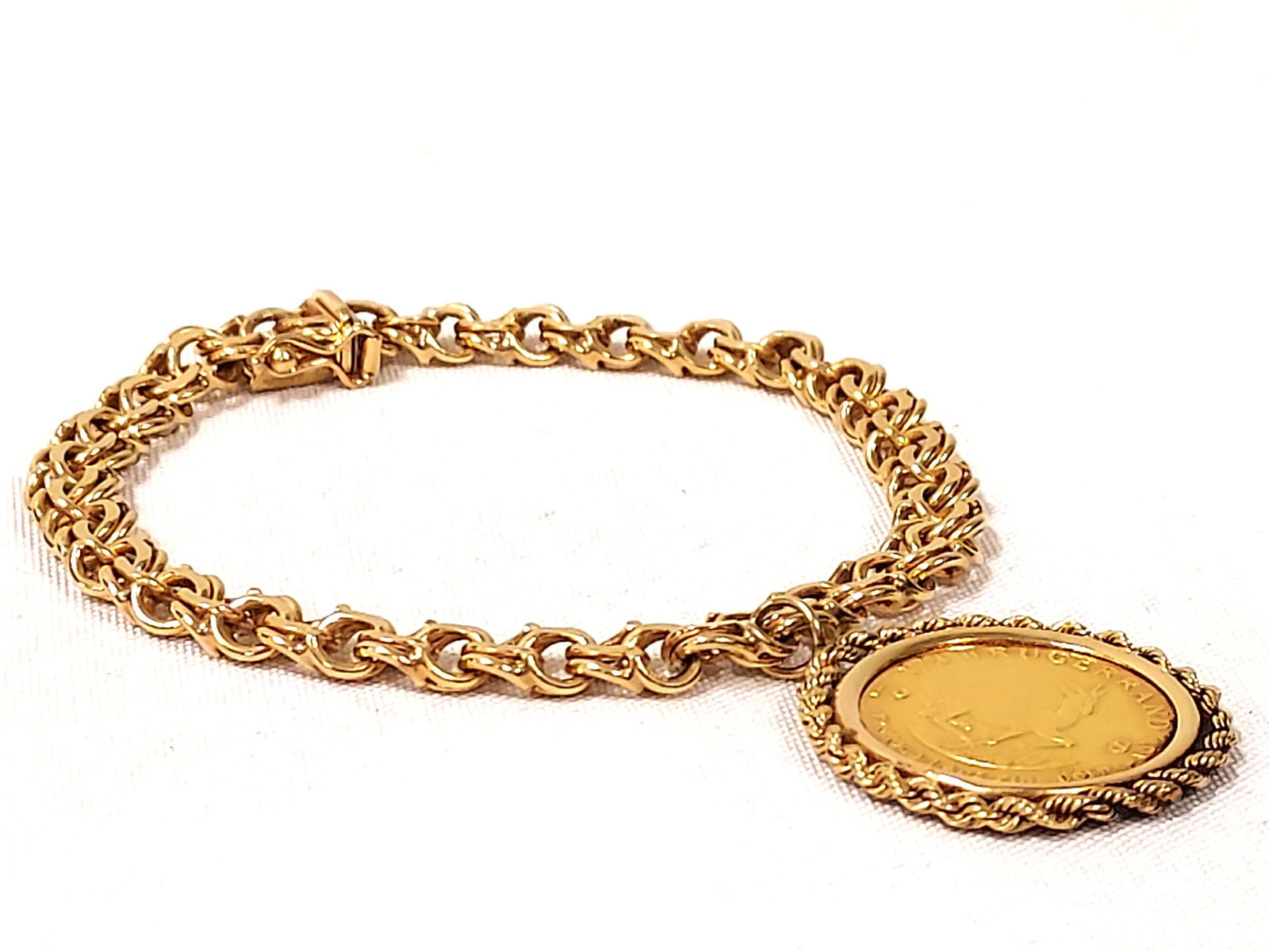 14KT GOLD CHARM BRACELET W/ 1/4 KRUGARAND (25) (1 of 7)