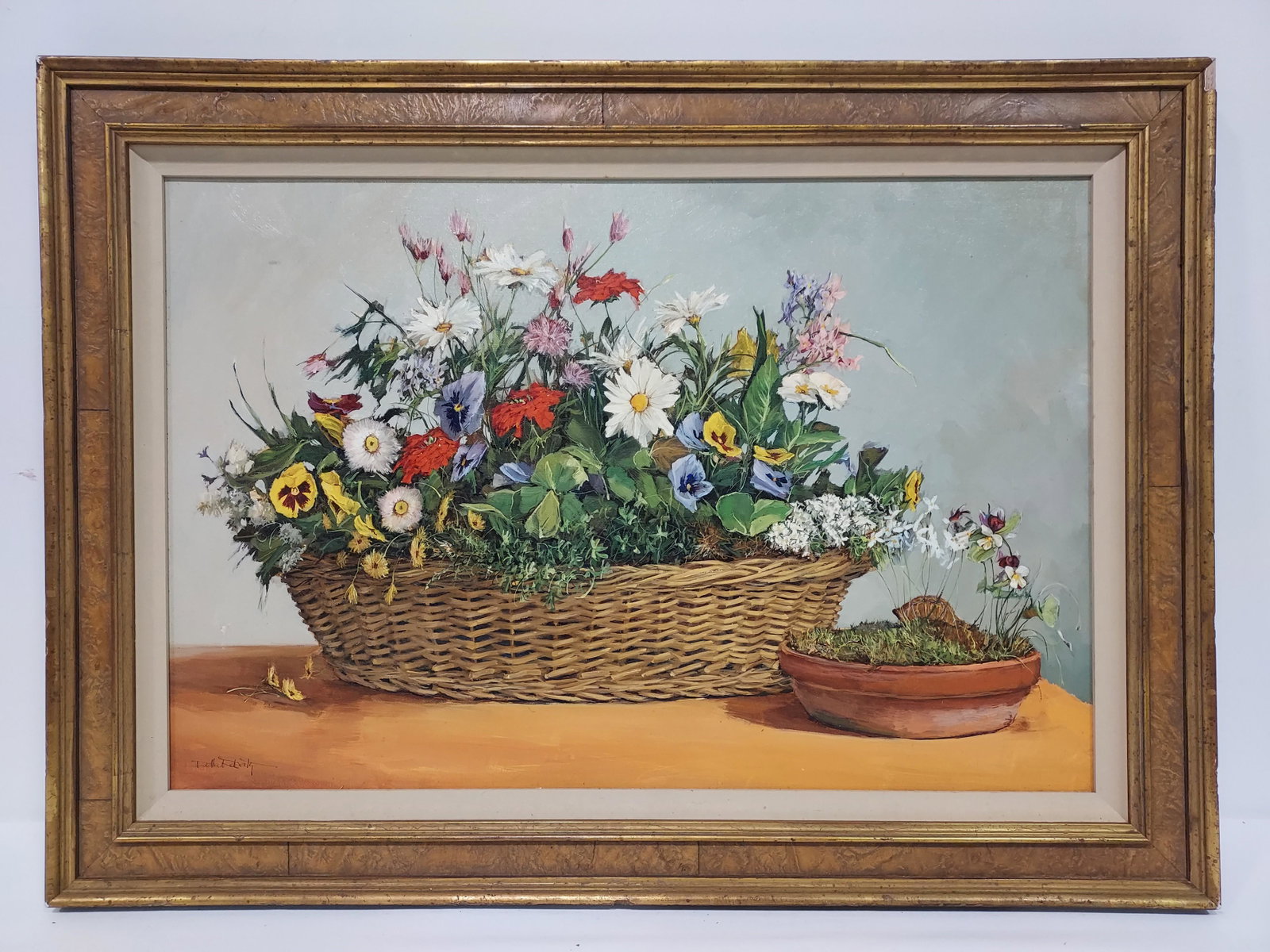 DELLA ROBERTS OIL ON CANVAS PAINTING: APRIL BASKET: Della Roberts oil on canvas painting, titled verso "April Basket". Measures (frame) 21.25" tall x 29" wide , and (sight) 15.75" tall x 23.5" wide. Condition: minor dings and scuffs to frame and mattin