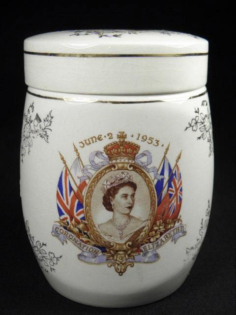 LANCASTER SANDLAND WARE QUEEN ELIZABETH COVERED JAR: Lancaster Sandland Ware Queen Elizabeth covered porcelain jar celebrating Queen Elizabeth's coronation. Possibly a tobacco jar or cigarette humidor. Depicts Queen Elizabeth with British flags. Marked 