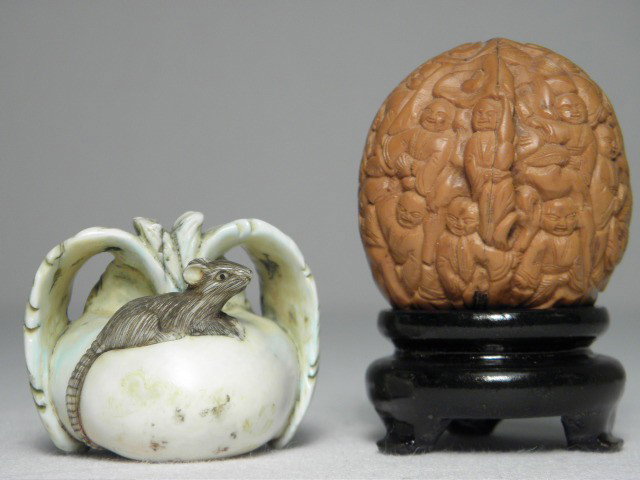 TWO JAPANESE CARVED KATABORI NETSUKE: Two Japanese carved Katabori Netsuke. Includes a carved Walnut (Kurumi) shell netsuke, and a carved ivory netsuke depicting a radish with a mouse on top. Ivory netsuke is signed on base, and tinted wi