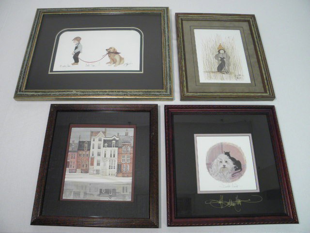 FOUR LIMITED EDITION P. BUCKLEY MOSS SIGNED PRINTS: Four framed and signed P. Buckley Moss prints. Limited editions of 1000 each. Includes a city housing block scene, initialed, numbered 667/1000, and dated '86 in pencil in lower right. Second is "Devo
