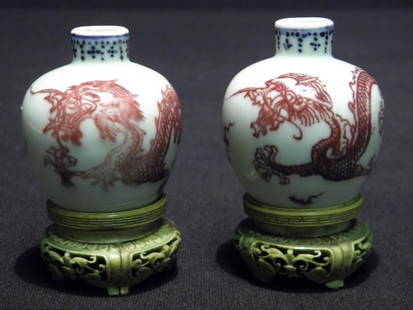 PAIR CHINESE MINIATURE CABINET BOTTLES WITH IVORY: Pair of Chinese miniature cabinet bottles with Peachbloom dragon decoration. Ch'ien Lung. Tiny ovoglobular jar painted with the five-clawed Imperial dragon in blue pursuing the flaming jewel. The