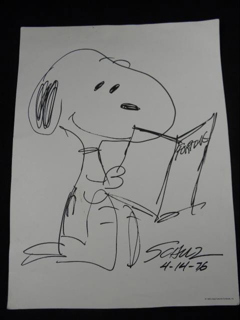 CHARLES SHULZ ORIGINAL PEANUTS "SNOOPY" SKETCHING: Original Charles Shulz sketching of the Peanuts character "Snoopy" reading a book. Done in black marker on thick paper marked "1958 United Features Syndicate, Inc" in lower right corner. Signed and da
