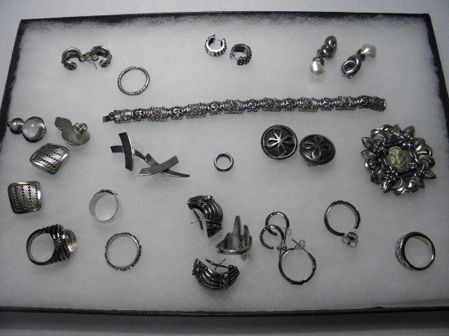 ASSORTED LADIES COSTUME JEWELRY: STERLING GEORGE J: Lot of assorted ladies costume jewelry. Includes pieces by Lois Hill, George Jensen, Vandell, "The Dreamer" etc. Includes mostly sterling silver pieces, but also silver toned. Rings, bracelets, pins, 
