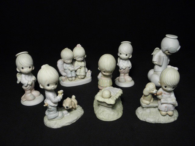 SEVEN PORCELAIN PRECIOUS MOMENTS & OTHER FIGURINES: Lot of seven porcelain "Precious Moments" and other figurines. Includes both Precious Moments and "Jonathan & David" figurines. Two Precious Moments "Part of Me Wants to be Good" figurines, and five "