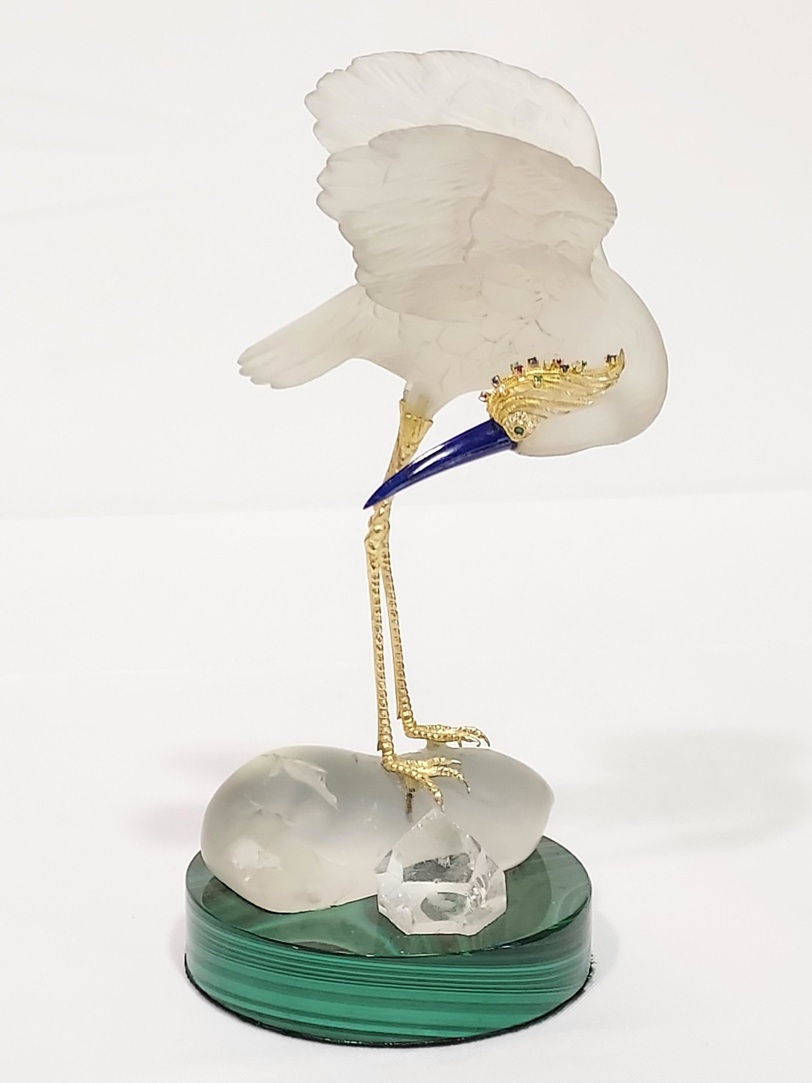 EXQUISITE 14k, ROCK CRYSTAL, MALACHITE LAPIS EGRET: Exquisite jeweled carved rock crystal egret with 14k gold legs and head plume, lapis beak and malachite base. Probably German, done in the manner of Faberge or Zadora. Head plume decorated with 14k go