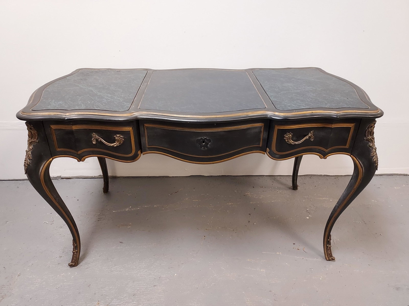 VINTAGE LOUIS XV STYLE FAUX FINISH WRITING DESK: Vintage Louis XVI Rococo style faux finished writing desk. Measures 29.5" tall x 53" wide and 27" deep. Condition: front drawer lock needs the surround re-attached (included), normal signs of age and 