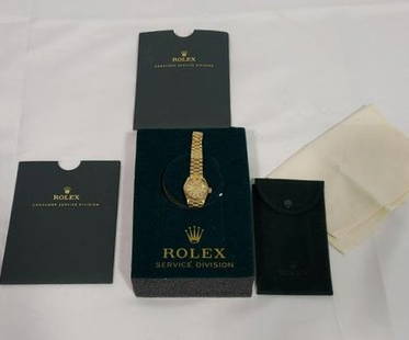 ROLEX LADIES 18KT DATEJUST WRIST WATCH: Rolex ladies 18 kt gold datejust wrist watch with champagne dial, and 18kt gold oyster bracelet. Serviced in by Rolex in 2013 for cleaning, a new crystal, and touch ups to case and bracelet. Serial Nu