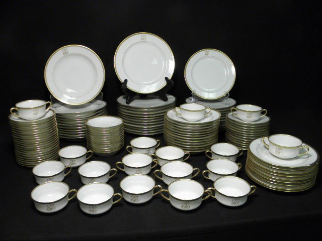 HAVILAND & CO LIMOGES GILT PORCELAIN DINNERWARE: 1: Haviland & Company Limoges gilt porcelain dinnerware made for Wright, Tyndale & Van Roden. All pieces are monogrammed "EE" on the edge. 118 total pieces, including (12) 7.5" soups, (9) 7.5" plates, (1