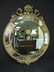 191: LARGE CIRCULAR GREEN & GILT WALL MIRROR