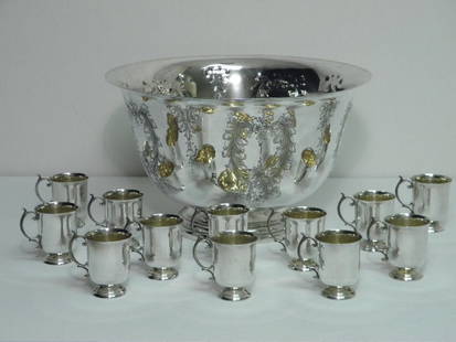 MANCHESTER SILVER CO. STERLING SILVER PUNCH BOWL S: Manchester Silver Co. sterling silver punch bowl set. Includes the hand chased sterling silver punch bowl, and twelve sterling silver cups. All pieces are stamped on base with Manchester Silver Co. ma