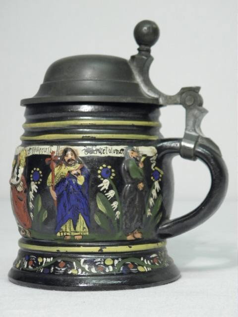 GERMAN KRUESSEN STYLE CERAMIC "APOSTELKRUG" BEER S: German Kruessen style ceramic "Apostelkrug" (Apostle Pitcher) beer stein. Stout shape with six Apostles in relief around the body (Peter, Andrew, James, John, Phillip, and Bartholomew). Unmarked, with