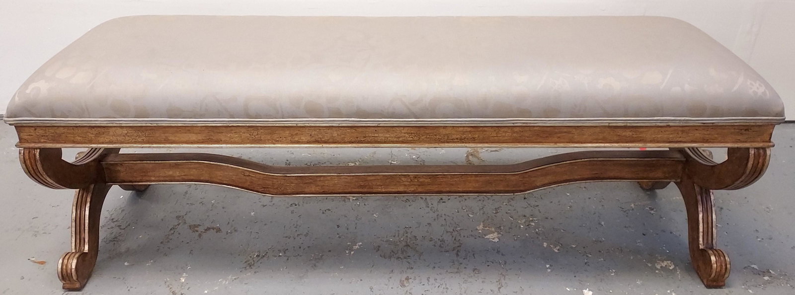 MODERN METALLIC FINISH CARVED WOOD BED BENCH: Modern metallic finish carved wood bed bench measuring 18.5" tall x 54.5" wide and 17.5" deep. Condition: a few spots to fabric near one end, see images. Weight: approx. 35 lbs.