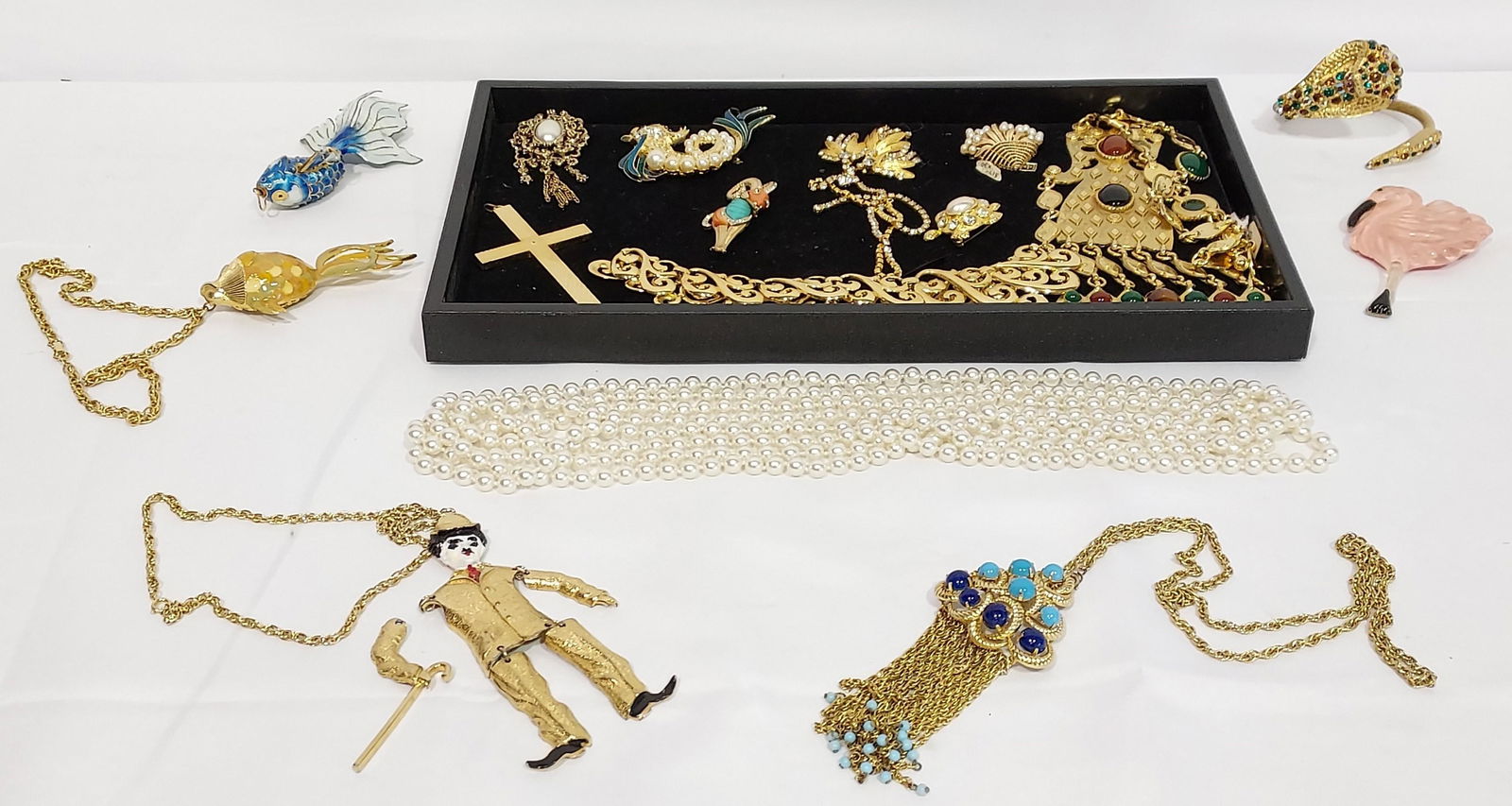 VINTAGE COSTUME JEWELRY STATEMENT PIECES 14 PC: A group of assorted costume jewelry statement pieces including: A a Grosse German faux turquoise & lapis lazuli tassel necklace, a 120" long faux pearl necklace (small repair), a Polcini enameled Char