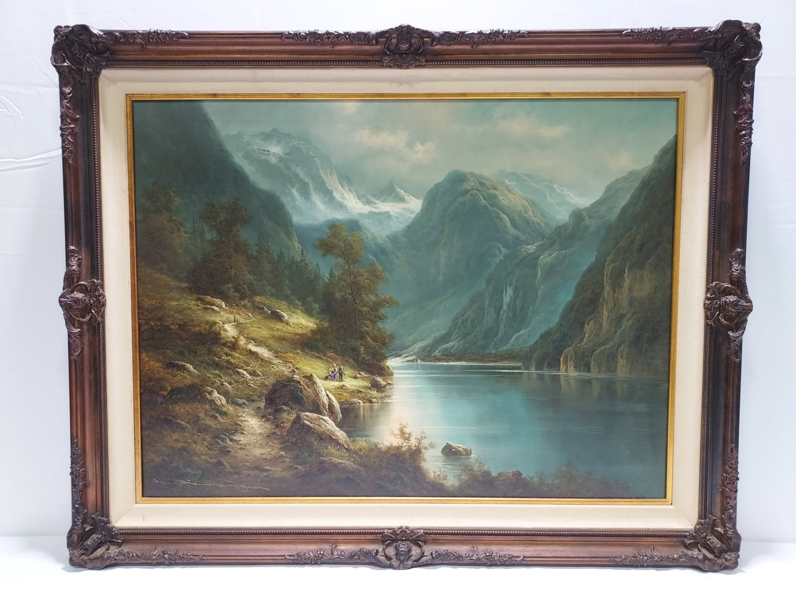 GERMAN OIL ON CANVAS PAINTING BERCHTESGADEN: Early 20th century German / Bavarian oil on canvas painting of Lake Koenigsee in Berchtesgaden, Bavaria Germany. Signed illegibly lower left. Measures (frame) 36" tall x 48" wide x 3.75" deep, and (si