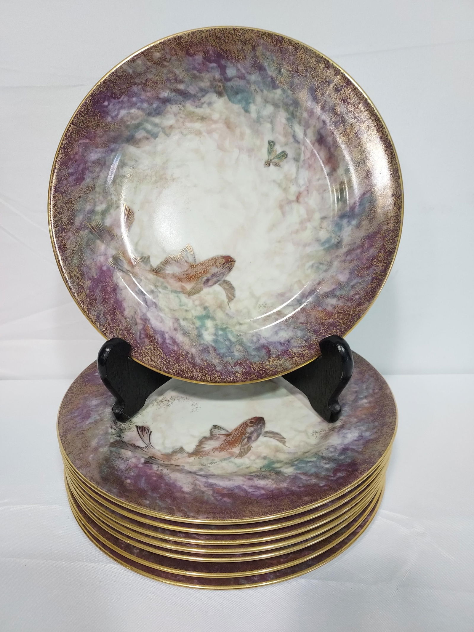 EIGHT DAUM "NATURE" SERVICE PLATES / CHARGERS: Set of eight Daum "Nature" service plates or chargers. Each one measures 11.75" diameter and is signed on base. Gold tone details. Condition: good, no signs of damage or use, see images. Weight: 15 lb