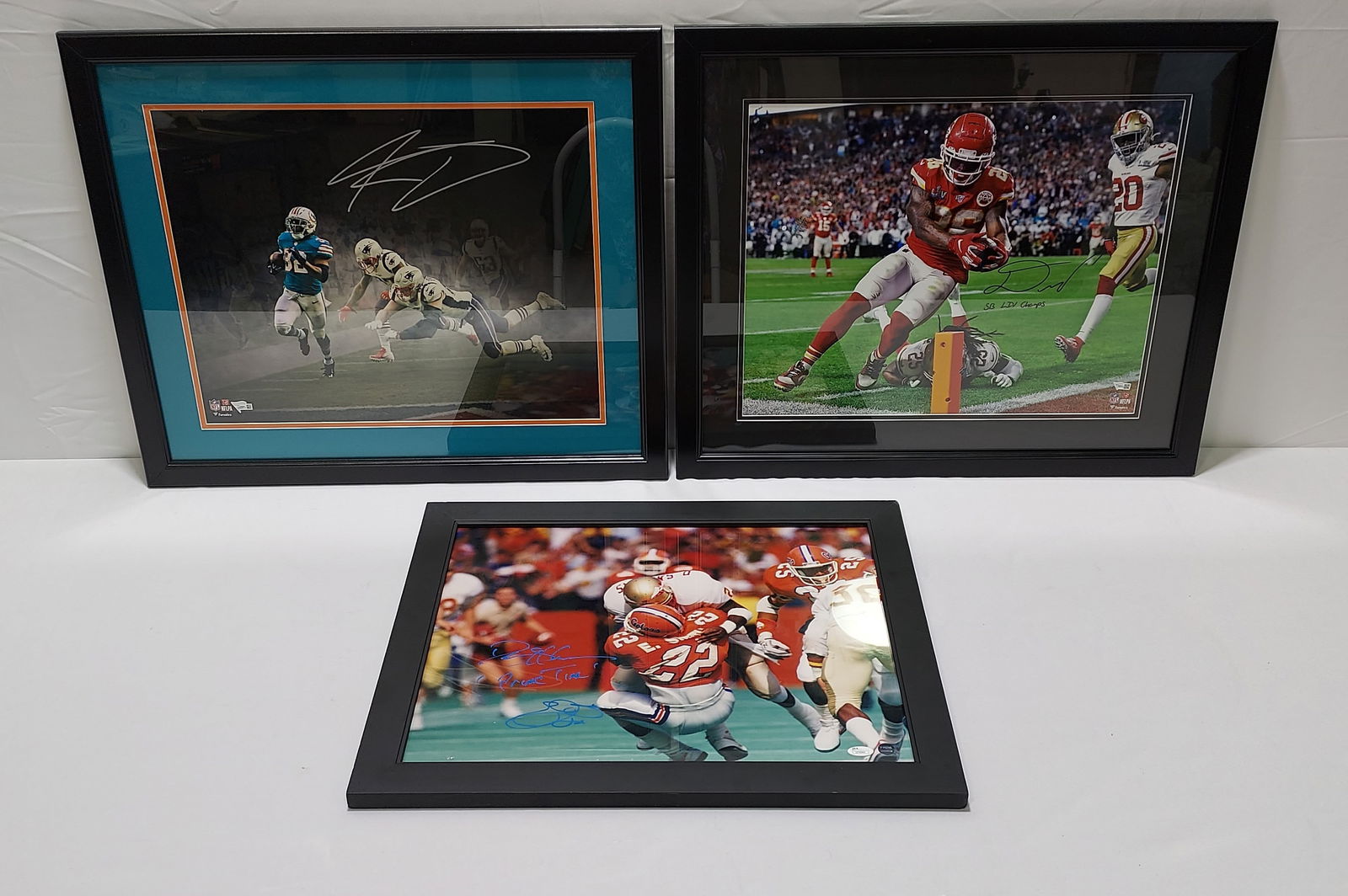 THREE AUTOGRAPHED NFL FOOTBALL PHOTOGRAPHS (1 of 15)