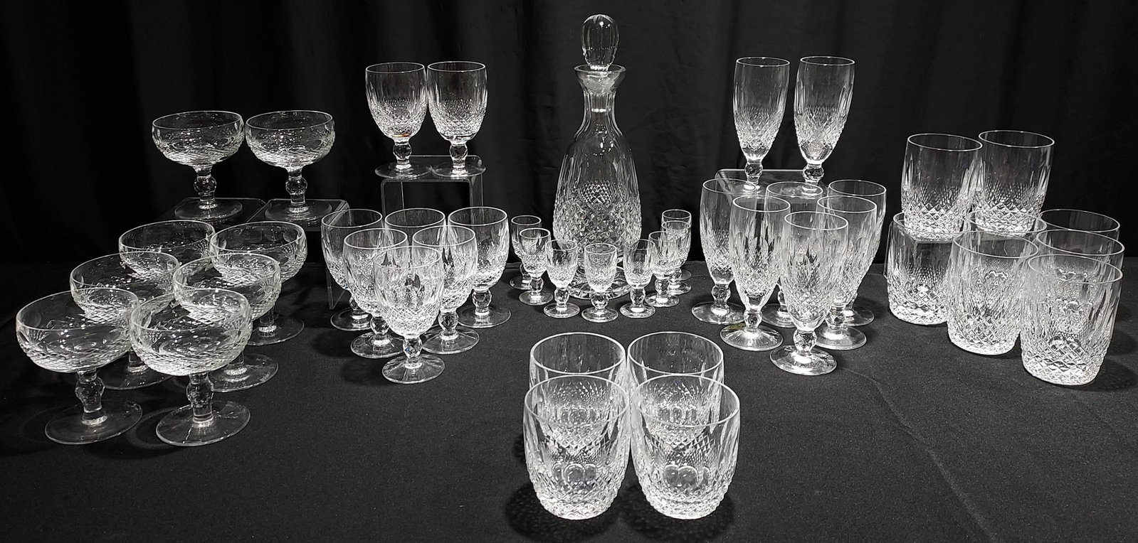 WATERFORD CRYSTAL "COLLEEN" STEMWARE 45 PC: Waterford crystal stemware in the 'Colleen' pattern. Lot consists of: 8 Tumblers 4.5" T x 3.75" W 8 Champagne Flutes 6" T 8 Wine stems 4 3/4" T x 2.5" 4 Old Fashion Rocks glasses 325" x 3" 8 Cordial g
