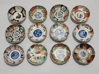 COLLECTION 12 ANTIQUE JAPANESE IMARI BOWLS: Collection of 12 antique Japanese Imari scalloped rim bowls. Each one measures about 6" diameter. Variety of styles. Condition: one has a chip to rim and one has a tiny flake to rim, 3 others have sma