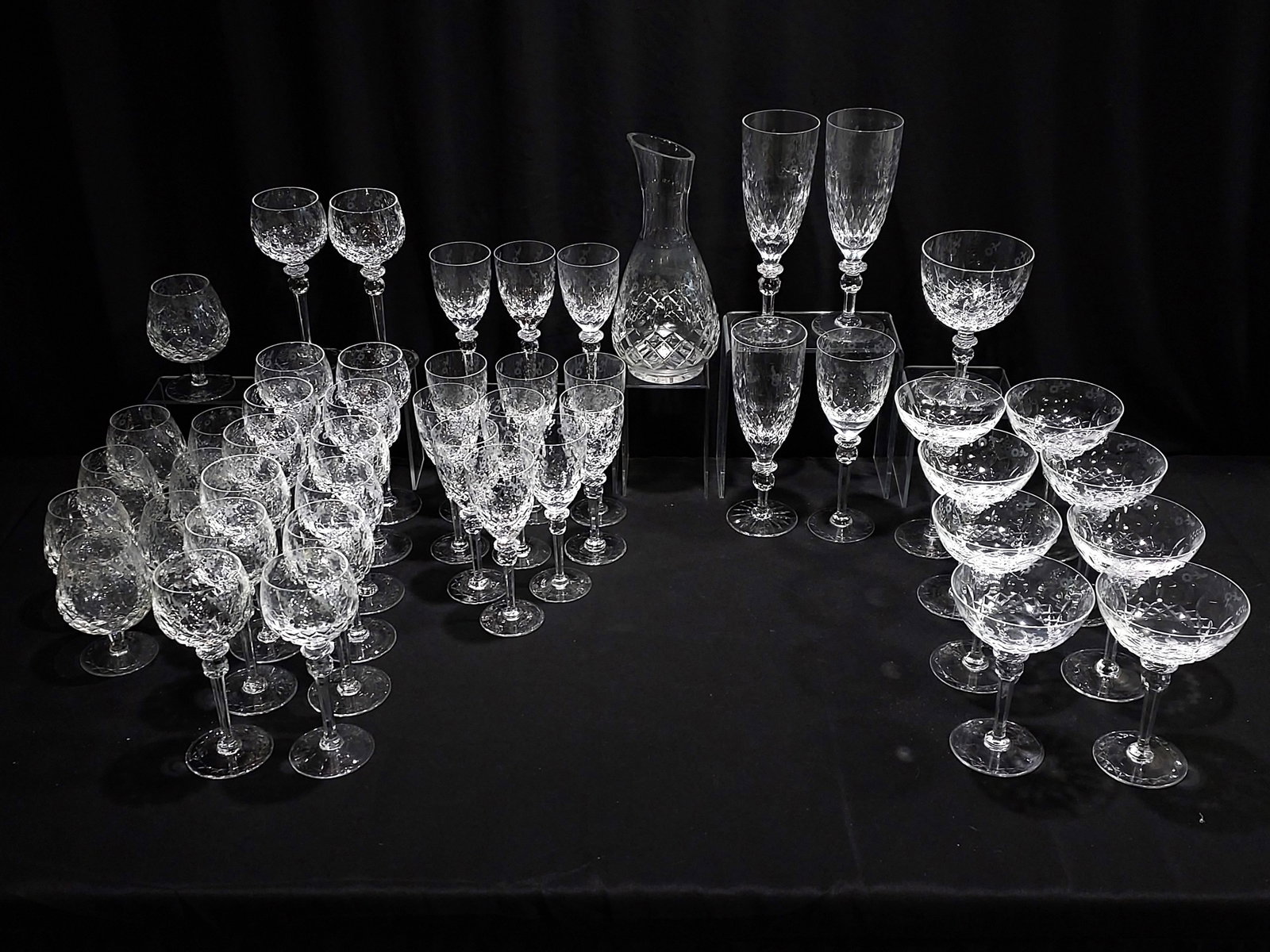 ROGASKA "GALLIA" CUT & ENGRAVED CRYSTAL STEMWARE: Rogaska "Gallia" pattern cut and engraved crystal stemware. Includes 48 pieces: (14) 8" Hock wine stems, (12) 7.75" wine stems, (8) 5" brandy glasses, (8) 7.125" champagne / tall sherbet stems, (3) 9.