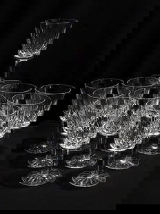 TEN WATERFORD "LISMORE" CUT CRYSTAL WATER GOBLETS: Lot of ten Waterford cut crystal "Lismore" pattern water goblets. Each one measuring 6-7/8" tall and signed on base. Condition: good, no signs of damages or scratches, see images. Weight: 8.5 lbs.