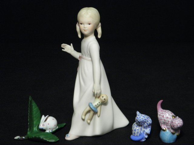 CYBIS & HEREND PORCELAIN FIGURINES: Lot of three Herend porcelain miniatures and one Cybis porcelain figurine. Herend pieces include a pink fishnet cat on a ball of yarn, a small blue fishnet cat, and a small rabbit leaf place card hold