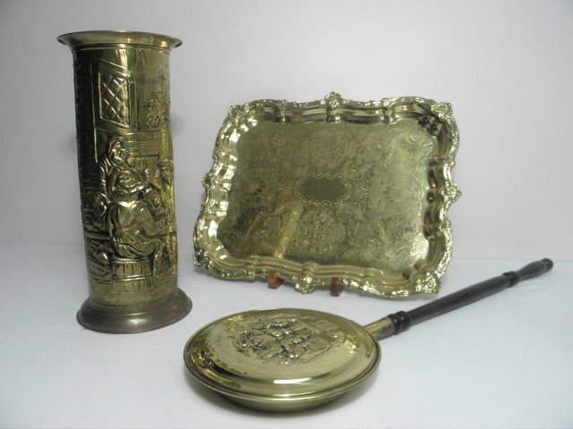 BRASS FINISH TRAY, UMBRELLA STAND, & BED WARMER: Group lot including all brass finish pieces: a bed warmer with mahogany handle, a gilt metal serving tray, and a small umbrella stand. All pieces are decorated with the repousse metalwork technique. C