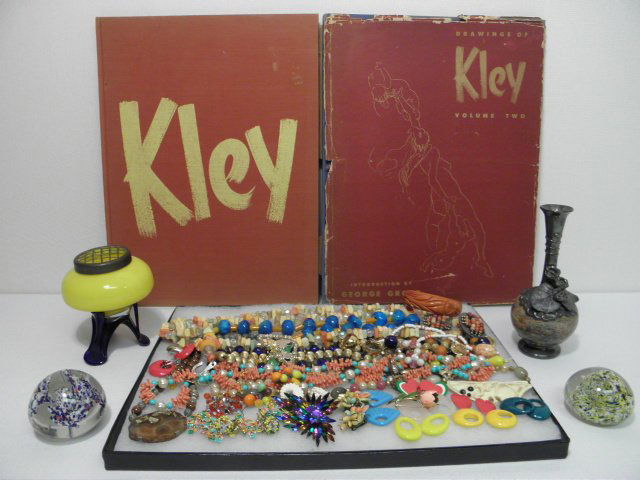 ASSORTED LADIES COSTUME JEWELRY & MORE: MONET ETC: Lot of assorted ladies costume jewelry and more. Includes a yellow and cobalt art glass flower frog, two hard cover books on the artist "Kley", two blown glass paperweights, a blown glass and metal mo