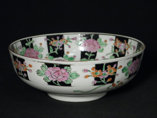 NIPPON JAPANESE PAINTED PORCELAIN BOWL: A Nippon Japanese porcelain bowl. Hand painted with flowers and fruit pattern. Marked on base "Nippon". Measures 9.5" wide and 3.5" tall. Condition: very minor wear and age to enamel, see images. Ship