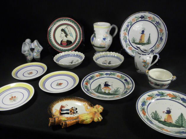 ASSORTED HENRIOT QUIMPER HAND PAINTED POTTERY: 14P: Lot of assorted Henriot Quimper hand painted pottery. Includes: a 9.75" plate, (2) 6.1" bowls with ribbed rims, (2) 8.25" plates, a small 5" wide handled dish, a small 5.25" tall pitcher, a 7.1" tall
