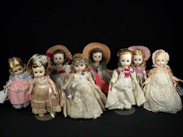 EIGHT VINTAGE MADAME ALEXANDER "ALEXANDER-KINS" 8": Group lot of eight vintage Madame Alexander "Alexander-Kins" dolls. Includes various dolls, such as "Mary, Mary", and "Wendy-Kin" in fabrics including chiffon, cotton, straw, and more. Each measures 8