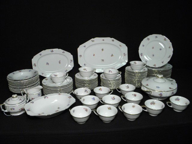 HEINRICH & CO FLORAL PORCELAIN DINNERWARE SET: 93: Heinrich & Co Bavarian porcelain dinnerware. Selb, Germany. Floral pattern with gilt highlights and striping. Includes a total of 93 pieces: (16) 6" saucers, (11) 10" plates, (11) 5.75" bowls, (10) 7.