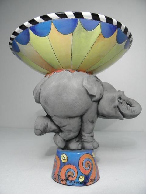 DANISHA CONTEMPORARY CERAMIC SCULPTURE: ELEPHANT B: DaNisha contemporary ceramic sculpture. Art pottery bowl, with an elephant form pedestal base. Sculpted by Dan Ferguson, and hand-painted by his wife, Nisha Ferguson. Signed and dated "Nisha 2007" on 