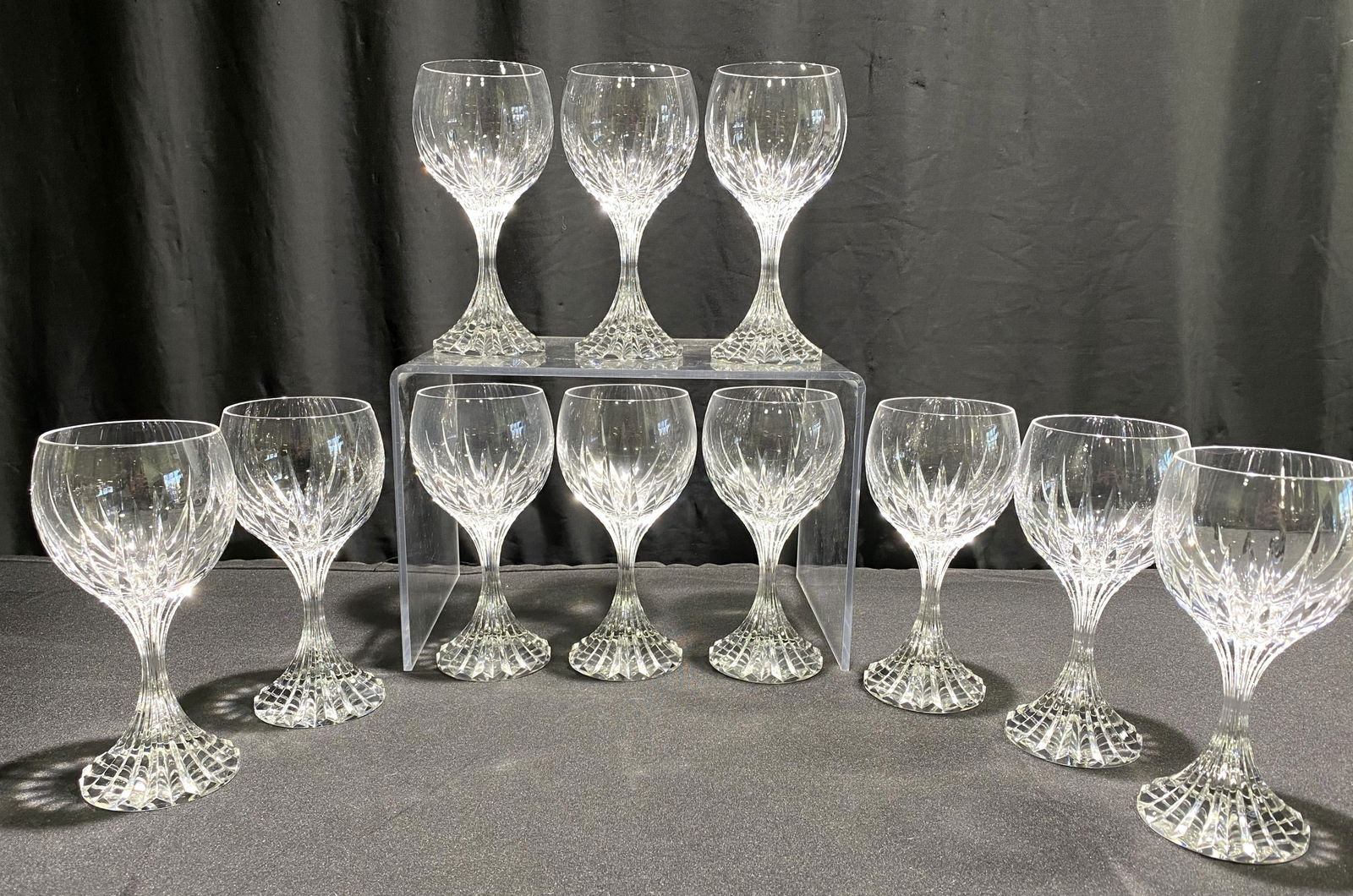 11 BACCARAT CRYSTAL MASSENA TALL WATER GOBLETS 7.5: 11 Baccarat crystal wine or water goblets in the Massena pattern. 7.1/2" x 3 1/8". Condition good. Shipping weight.13 lbs